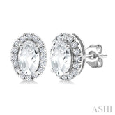 5x3 MM Oval Shape White Topaz and 1/8 Ctw Round Cut Diamond Halo Semi-Precious Stud Earrings in 14K White Gold