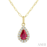 6x4 MM Pear Shape Ruby and 1/6 Ctw Round Cut Diamond Halo Precious Pendant with Chain in 14K Yellow Gold