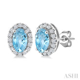 5x3 MM Oval Shape Aquamarine and 1/8 Ctw Round Cut Diamond Halo Semi-Precious Stud Earrings in 10K White Gold