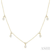 5/8 Ctw Dangle Oval and Round Cut Diamond Station Necklace in 14K Yellow Gold