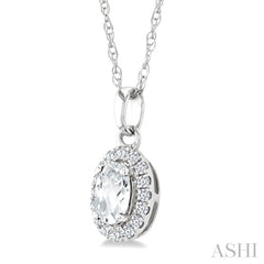 5x3 MM Oval Shape White Topaz and 1/20 Ctw Round Cut Diamond Halo Semi-Precious Pendant with Chain in 10K White Gold