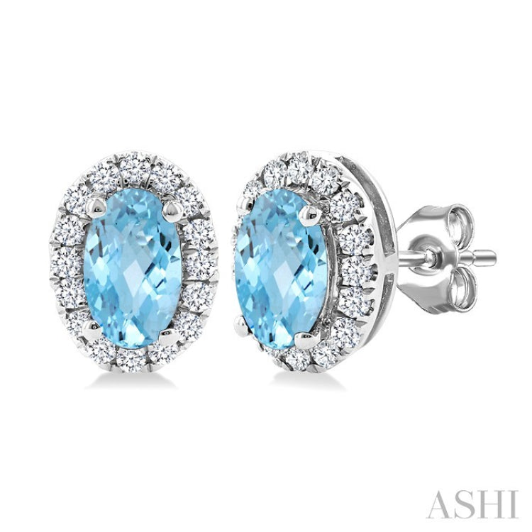 5x3 MM Oval Shape Aquamarine and 1/8 Ctw Round Cut Diamond Halo Semi-Precious Stud Earrings in 10K White Gold