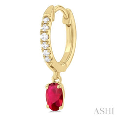 5x3 MM Oval Cut Ruby and 1/8 Ctw Petite Round Cut Diamond Precious Fashion Huggies in 10K Yellow Gold